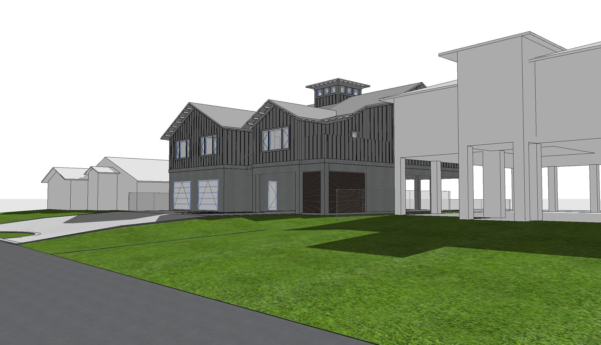 Street view of a custom Sarasota County coastal residence designed by CMSA Architects.