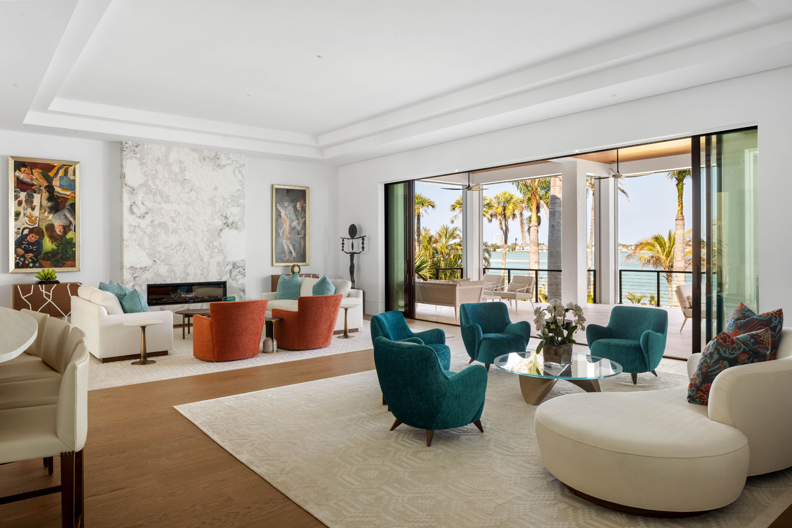 026_Norsota_Trinity_CMSA_RyanGammaPhotography_1 Living room with large windows, natural light, and refined coastal interior design