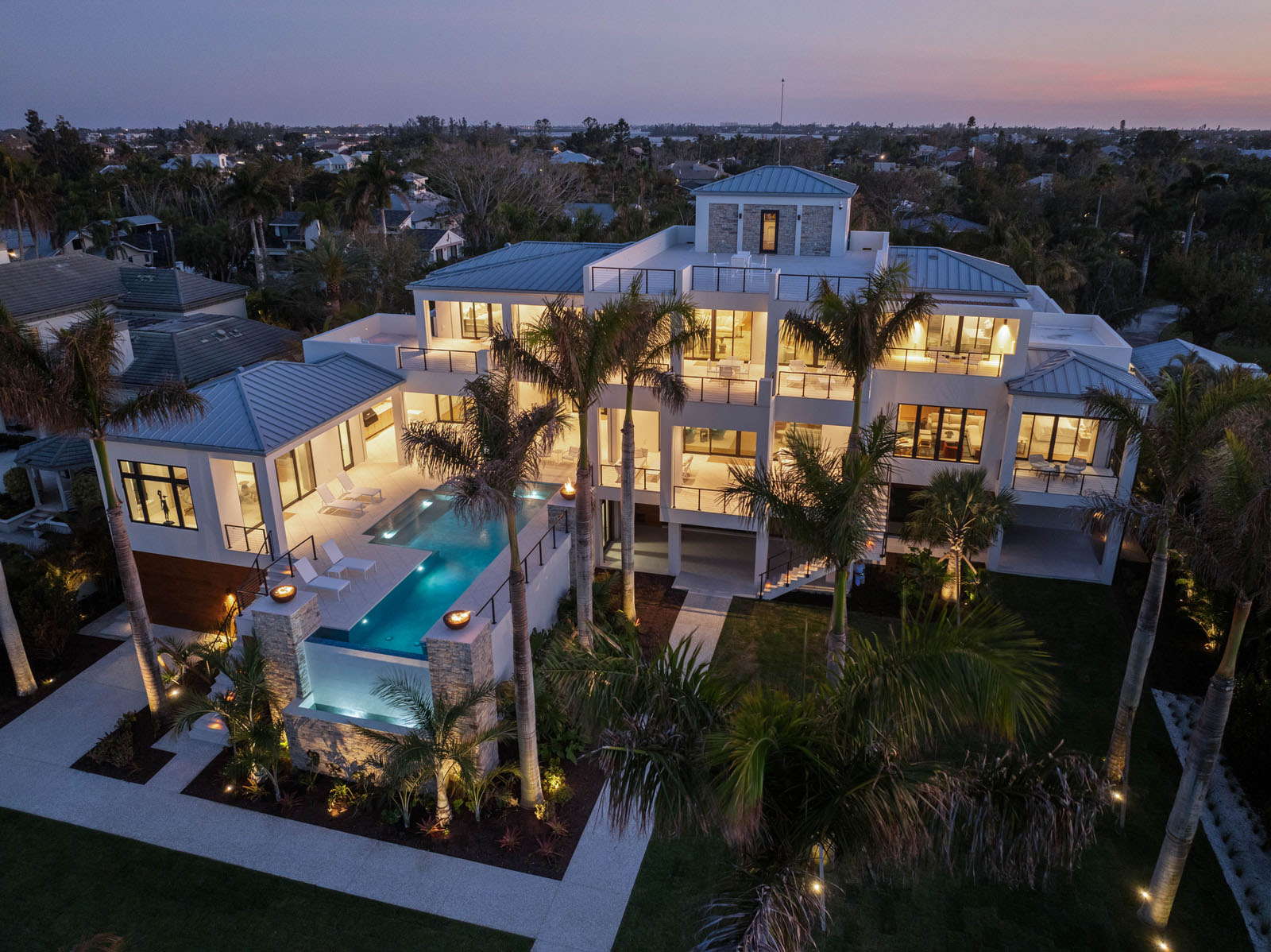 default Waterfront elevation with private dock and landscaped shoreline along Sarasota Bay